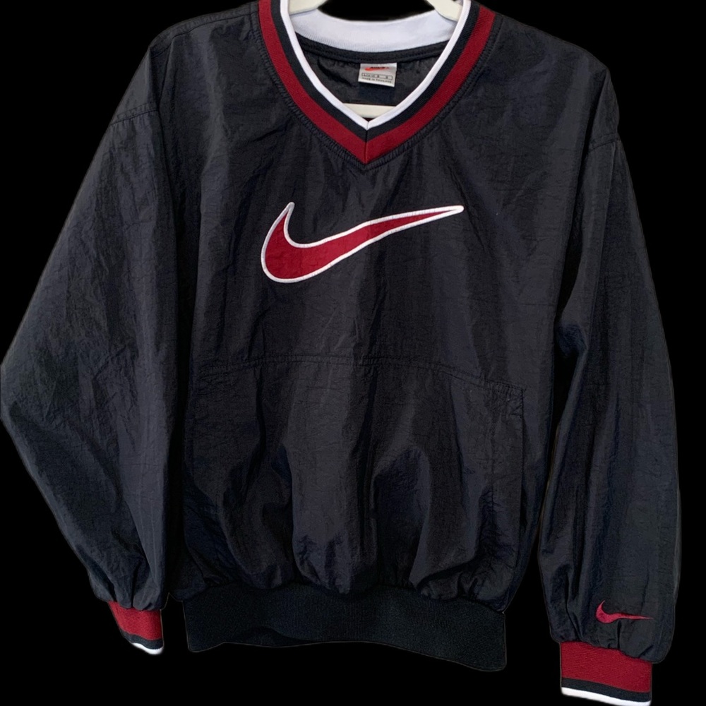 Vintage Nike wind breaker with front pocket. Youth 14/16.